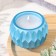 Candle "Shar" in a candlestick with sharp faces of gypsum, 7x6cm, blue