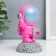 Souvenir Polystone "Astronaut on the Moon" bright pink 11.5x6.5x6.5 cm
