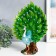 Polystone souvenir "Blue peacock with green, blossoming tail in the meadow" 13x30x35 cm