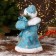 Santa Claus "In a blue fur coat with gifts" moves, with backlight, 30 cm