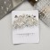 Hair crest "Safyan" flowers, 7x8 cm, silver