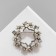 Brooch "Flowers" in a wreath, the color is white in matte silver