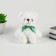 Soft toy "Bear", with a green bow