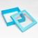 The box is folding, cover is, turquoise, with a window 30 x 30 x 8 cm