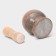 A mortar with a “marble” push, made of natural stone, brown color