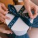 A satin tape with a new year, 25 mm, 23 ± 1 m, dark blue color