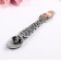 Spoon of a doll souvenir "style".