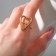 The ring "minimal" the heart, the color is gold, dimensionless