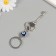 Keychain from the evil eye Metal "key with crown" 3x8.2 cm