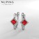 Earrings with rhinestones Xuping paradise, red color in silver
