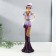 Polystone souvenir "Lady in a lilac-violet dress, in a hat, with a clutch" 9.5x9x32 cm