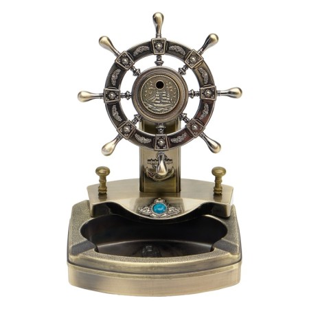 A tabletop lighter with an ashtray, gas "helm"