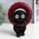 Souvenir Polystone Light "Black dog hid in the wheel" from the sun. Battery 19.5x11x13.5 cm