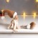 Interior doll "Baby with ponytails in a beige outfit" 62 cm