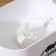 A dispenser for a detergent with a stand for the Raccoon sponge, 550 ml, sponge in the kit, white color