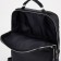 A backpack with a zipper, "saxi", outer pocket, black color