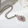 Pendant "heart" with a rhinestone, white-pink color in silver, 42 cm