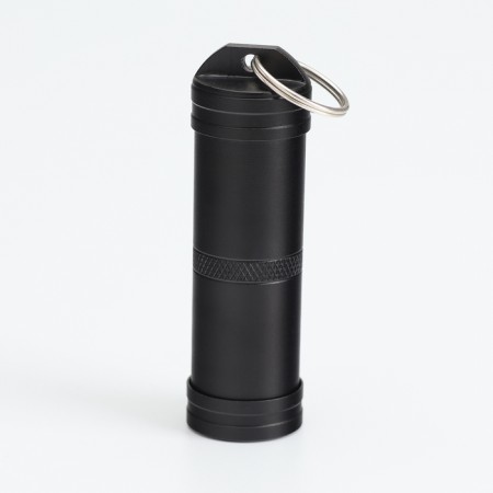Waterproof keychain-container for small things, black, 7 cm