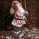 Santa Claus "In a suit with ornaments, skis and twigs" 60 cm, red-white