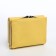 Women's wallet on the button, yellow color
