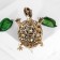 Brooch "Turtle" in large rhinestones, colored in black gold