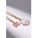 Kulons "Demetrons" cat with a bow, white-pink color in gold, 45 cm