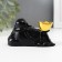 NECKE Polystone "Hothee with a gold merging, lies on a bag" Black 5x8.5x5 cm