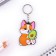 A wooden key key "Corgi with avocado", 4.4 x 6.4 cm