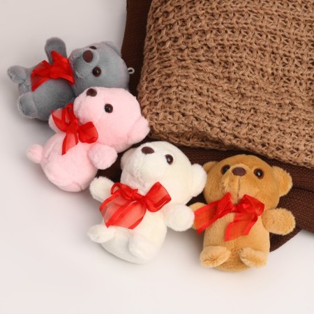 Soft toy "Bear", with a bow, color mix