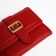 Women's wallet on the button, red color