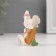 Polystone pigeons in a pink wreath 6*4 cm