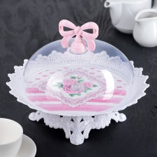 A dish for a cake and cakes with a lid 