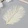 Decorative ostrich feather "Light yellow" h = 15-20 cm