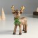 Souvenir Polystone "Olennian in a green scarf with golden horns" 7.3x12x18 cm