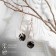 Hanging earrings with rhinestones "drop with a rhombus", black color in pink gold, 7.2 cm