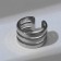 Trinity ring is smooth lines, the color is silver, dimensionless