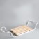 The bath seat is sliding, wooden