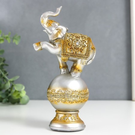 Souvenir Polystone "Elephant on a ball in the openwork blanket" 19x8.5x5.5 cm