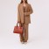 Women's bag El Masta with a zipper, external pocket, long belt, redhead color