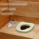 Anatomical seat for street toilet, 41 × 35 cm, polyurethane foam, green