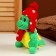 Soft toy "Dragosh", in a red hat, 15 cm, green color