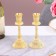 A set of 2 candlesticks, metal, 8 x 8 x 16.5 cm