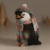 Polystone souvenir "An angry penguin in a hat with a bomb, in a colored scarf" 9.5x9.5x12.5 cm