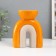 Ceramics candlestick for 1 candle "Medusa" sand-orange 11.7x8x15 cm
