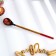 Spoon for pickles, with artistic painting, black, Khokhloma