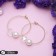 Busin-roller earrings with a rhombus, d = 6 cm, white color in gold
