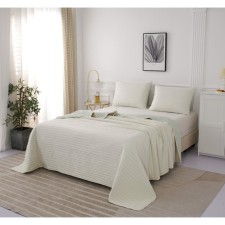 The bedspread and pillowcase 