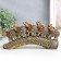 Polystone souvenir "Five elephants on a tusk with flowers" Bronze 20.5x4x11 cm