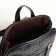 City backpack on a zipper, black color