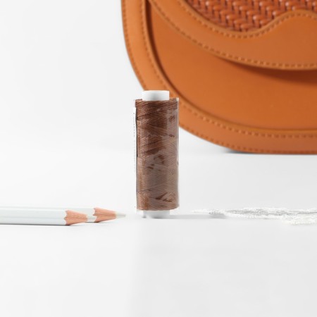 The threads are waxed, round, 300d/3, 0.35 mm, 60 ± 2 m, the color is light brown-3